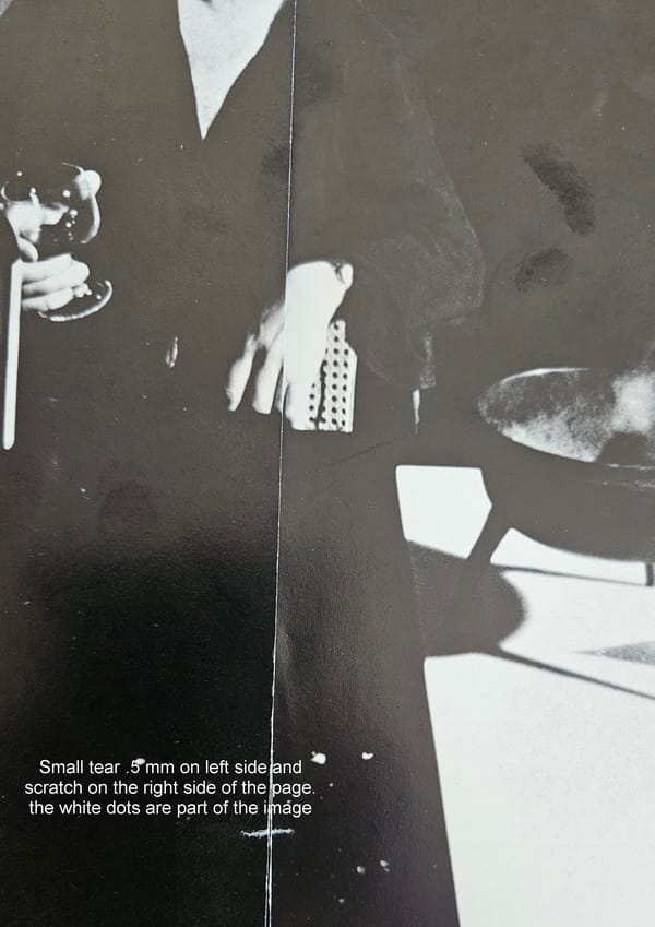 Small tear on back page